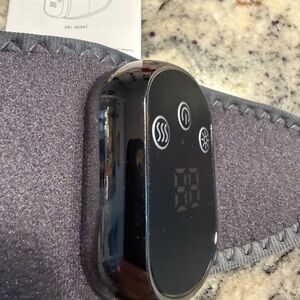 Gray Heated Massage wrist and hand wrap